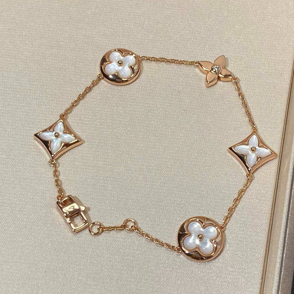 ˇTrend JewelryˇArmband aus Roségold mit Stern- und Sonnenmotiv, 5 Motive