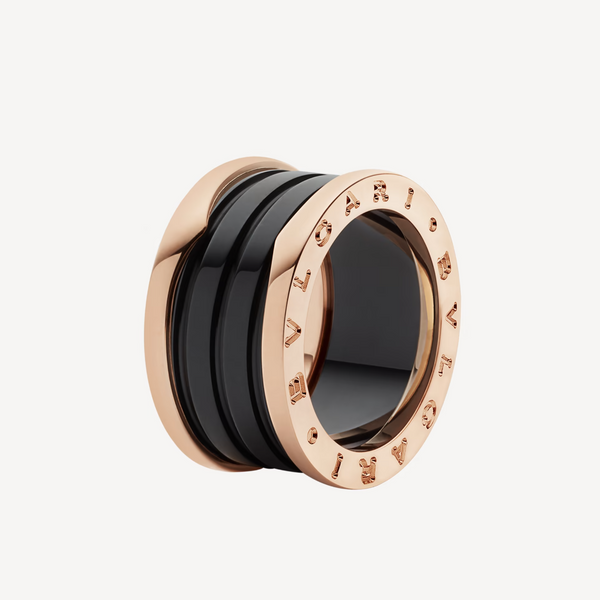 ˇTrend JewelryˇZERO 1 VIERBAND-SCHLEIFEN UND SCHWARZE KERAMIK-SPIRALE ROSA GOLDRING