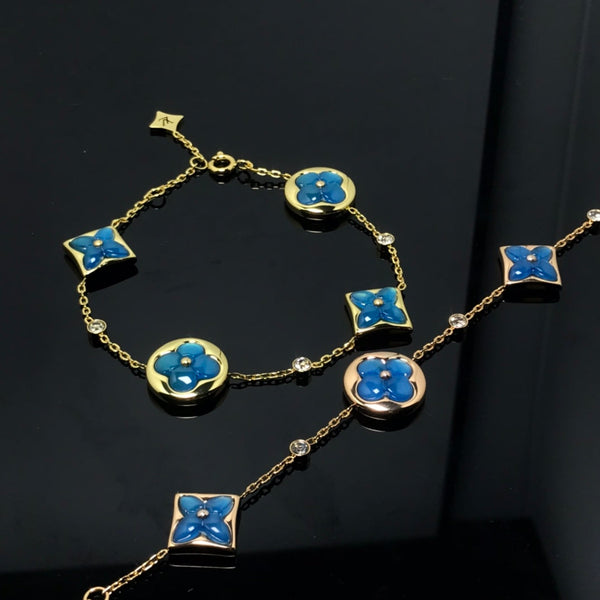 ˇTrend JewelryˇStern und Sonne 4 Motiv blau Armband
